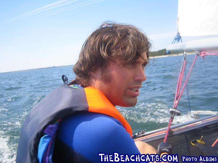 Out on the water. Where are these strong winds the sign was talking about?