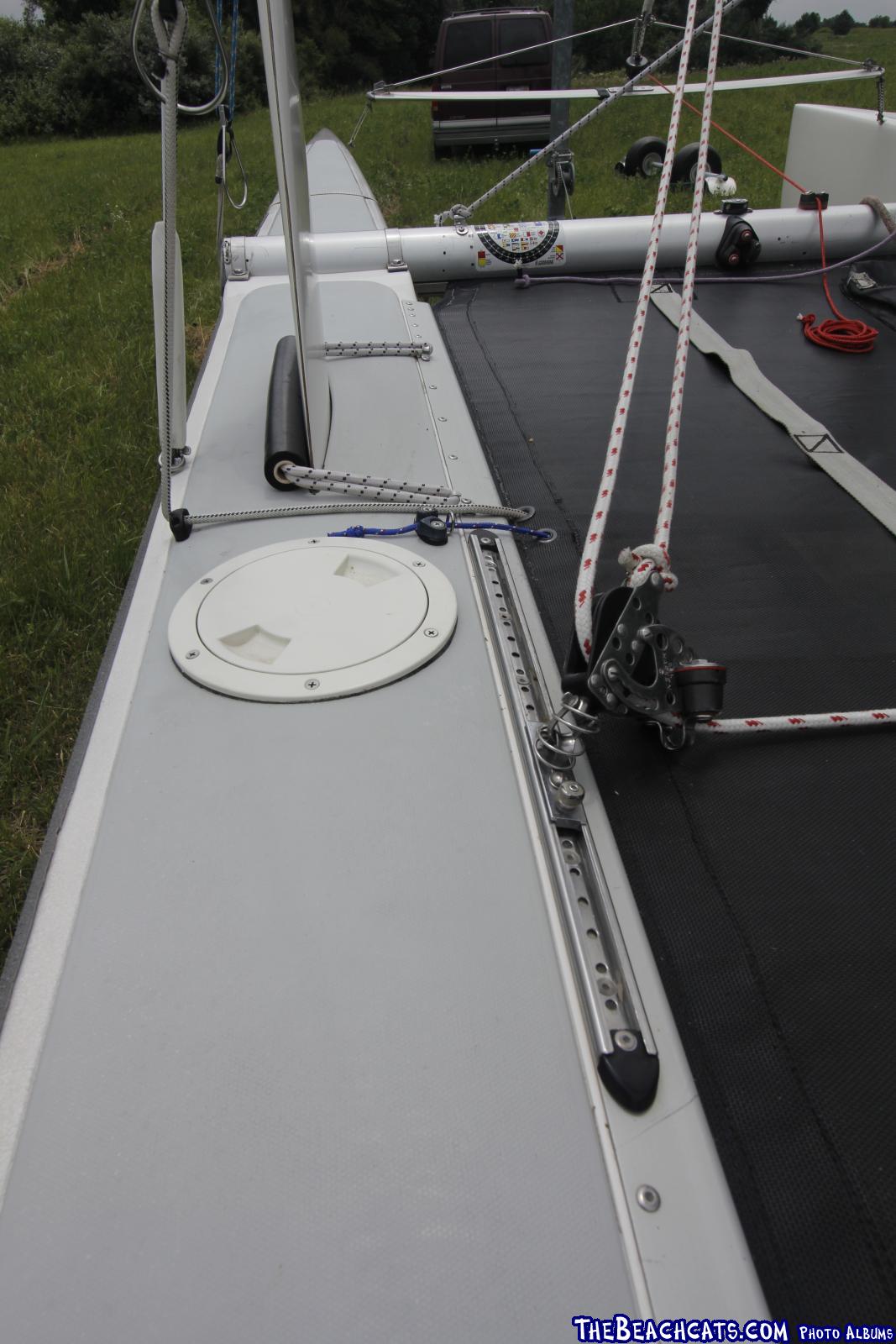 Inspection port for repair of tail of daggerboard trunk on a Nacra