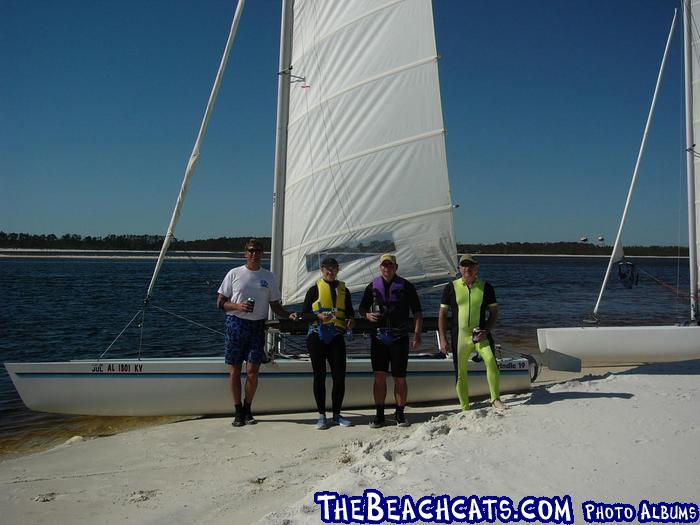 Phillip Mumm, Meg Gilmer, me and Steve Lowery hanging at on the beach.