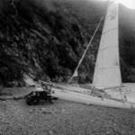 (solo) hauling out "Whisk" on the beach at Goat Harbor, Catalina Island