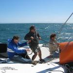 Oggie, Dave and Andy hoisting the 2nd anchor we occasionally used.