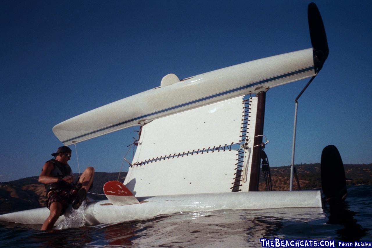 A Hobie 18' on its side.