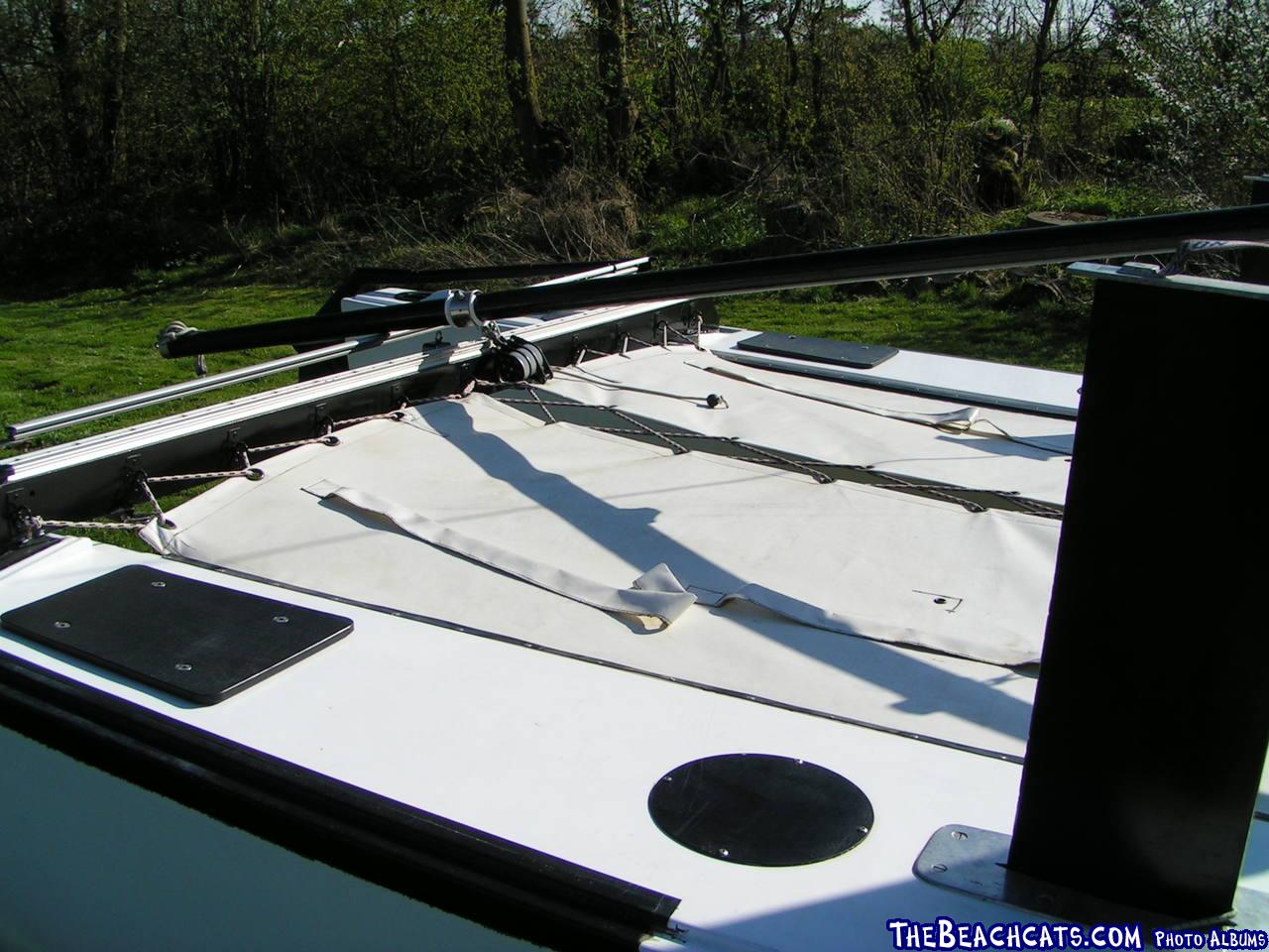 20 foot catamaran with Hobie mast and sails Please help identify