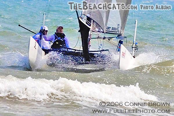 Team Cuba Libra cuts through the surf just before finishing.