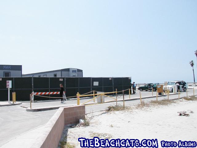 Parking Lot
 is not normally fenced off and used for temp trailer buildings as it is in this photo