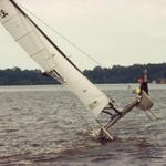 Cross Lake - PAUL Waves HI While Flying HOBIE 18