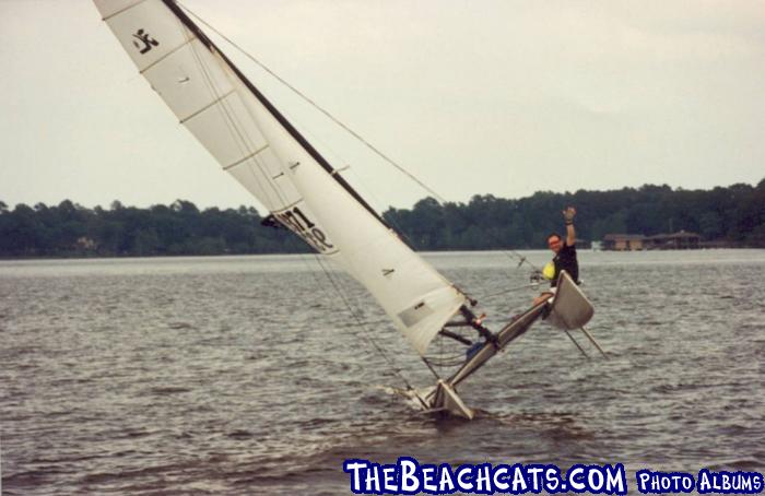 Cross Lake - PAUL Waves HI While Flying HOBIE 18