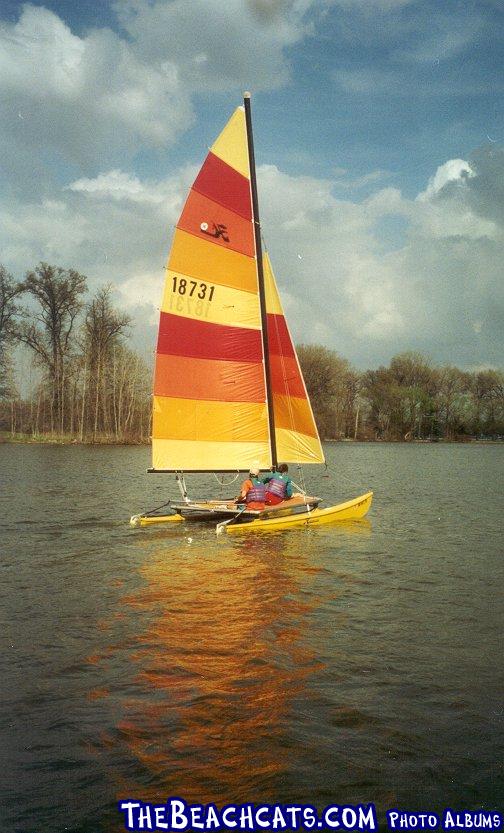 Our second sailing.  Full sails, but no plugs in the hulls.