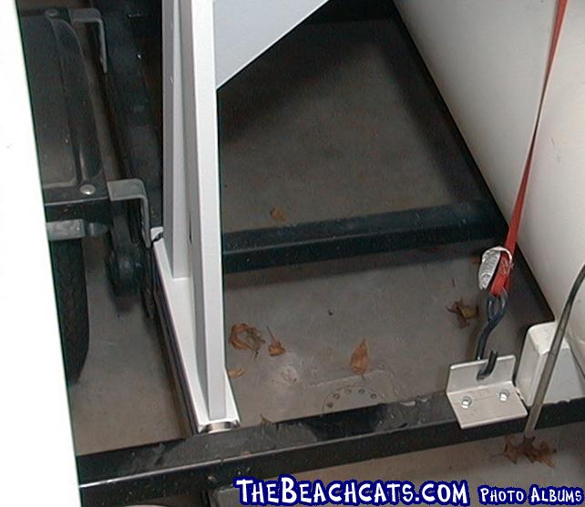 Front support is held to trailer with 4 stainelss steel hose clamps (worm gear clamps)