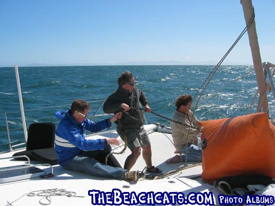 Oggie, Dave and Andy hoisting the 2nd anchor we occasionally used.