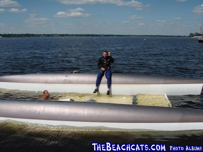 Garret Tenkel on his flipped Stiletto. She was a victim of a waterspout that ripped through the moorings in July 2006.